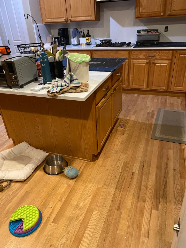 Before photo of Denver kitchen showing traditional oak cabinets and dated cabinet finish