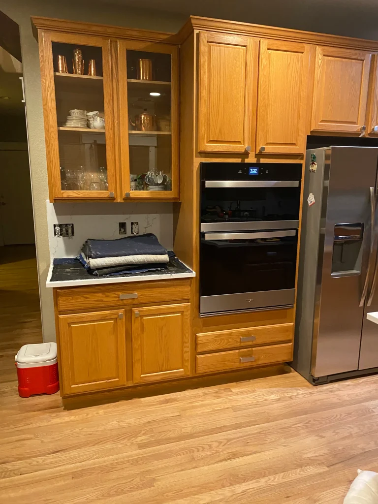 Original Denver kitchen layout prior to cabinet refacing with oak cabinetry and island